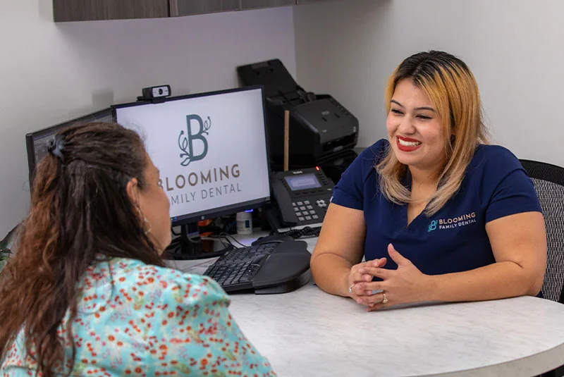 Patient scheduling an appointment at the front desk